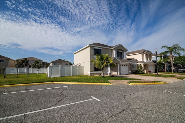 1101 Sandestin Way, Orlando, FL 32824 - view of front facade with a residential view, stucco siding, and uncovered parking