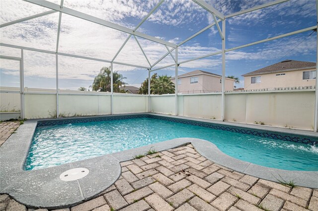 1101 Sandestin Way, Orlando, FL 32824 - swimming pool featuring a patio and a lanai