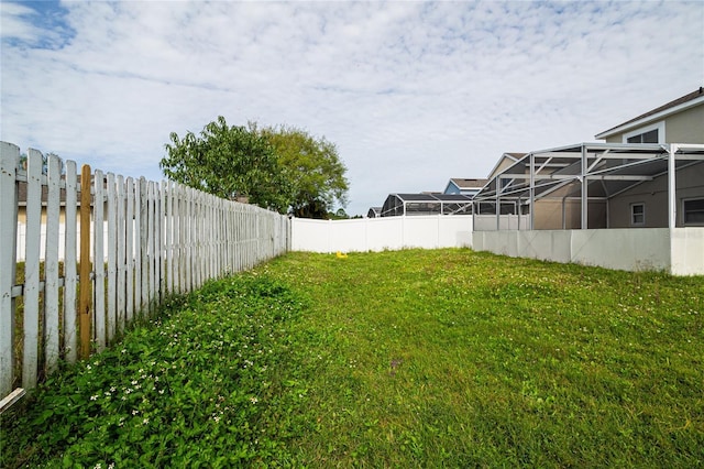 1101 Sandestin Way, Orlando, FL 32824 - view of yard featuring a lanai
