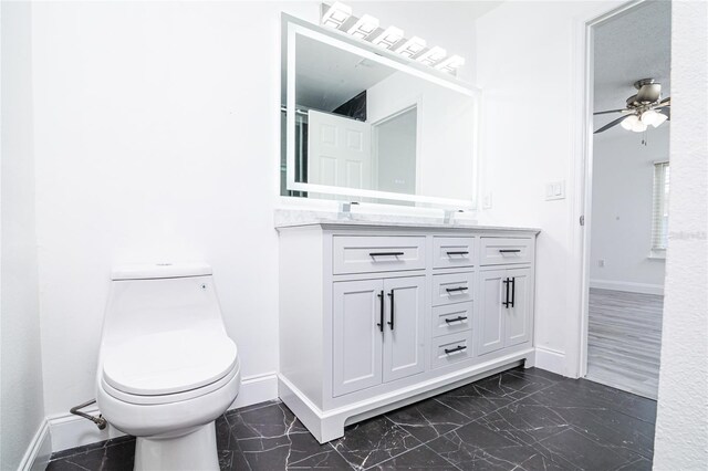 1101 Sandestin Way, Orlando, FL 32824 - bathroom featuring marble finish floors, double vanity, and a ceiling fan
