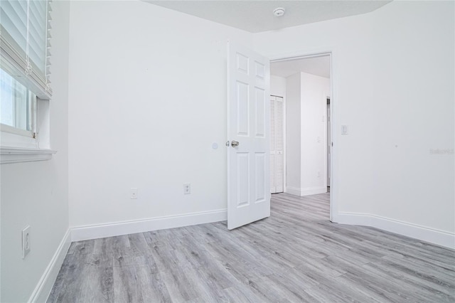 1101 Sandestin Way, Orlando, FL 32824 - unfurnished room featuring wood finished floors and a smoke detector