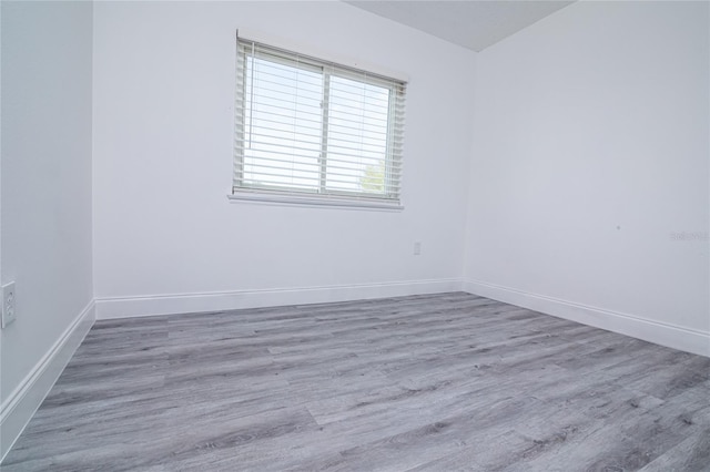 1101 Sandestin Way, Orlando, FL 32824 - empty room featuring wood finished floors and baseboards