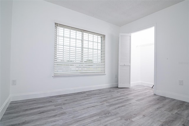 1101 Sandestin Way, Orlando, FL 32824 - spare room with wood finished floors and baseboards