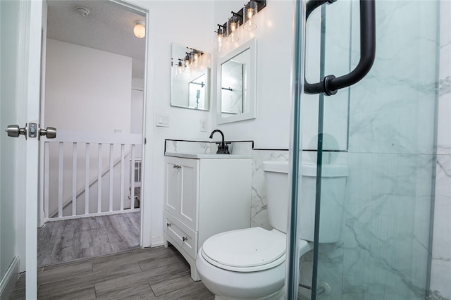 1101 Sandestin Way, Orlando, FL 32824 - bathroom with vanity, an enclosed shower, and wood finished floors