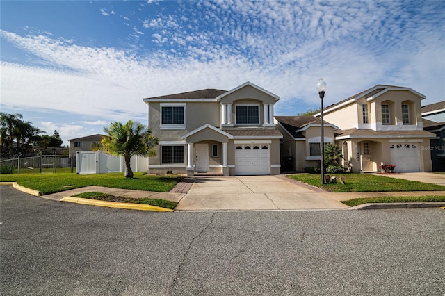 1101 Sandestin Way, Orlando, FL 32824 - traditional-style home featuring stucco siding, driveway, and an attached garage