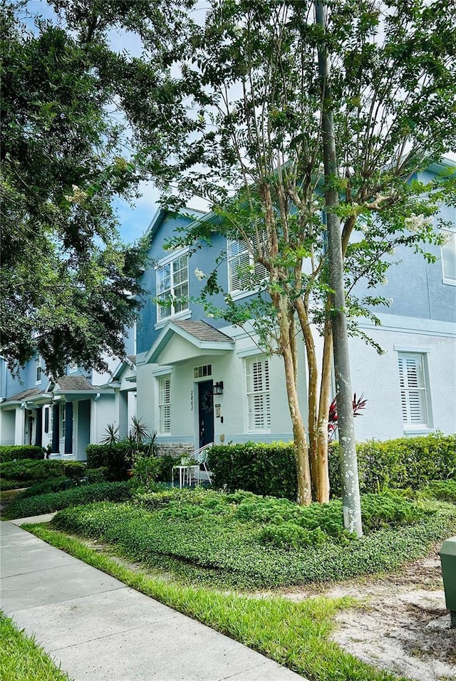 2862 Grasmere View Pkwy, Kissimmee, FL 34746 - traditional-style home with stucco siding