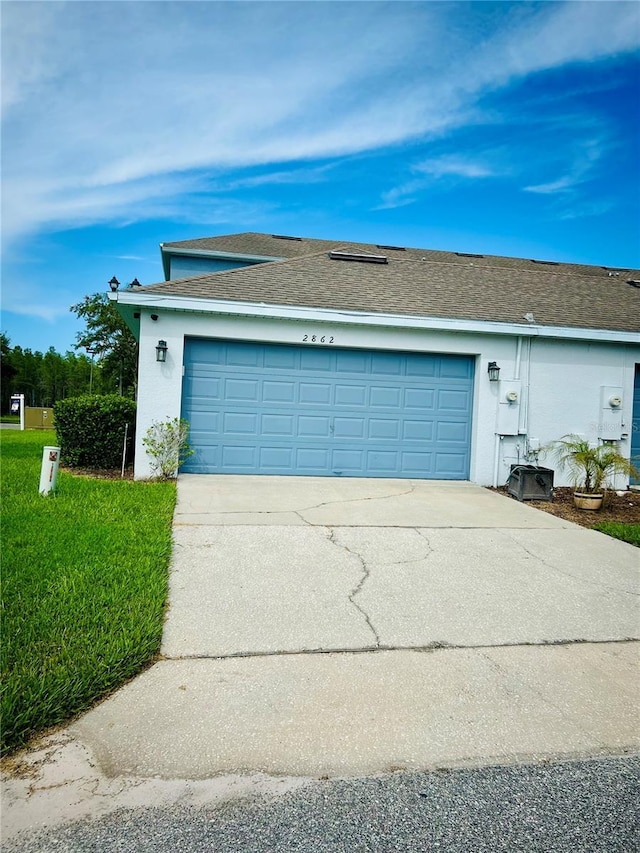 2862 Grasmere View Pkwy, Kissimmee, FL 34746 - garage with concrete driveway