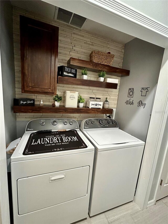 2862 Grasmere View Pkwy, Kissimmee, FL 34746 - laundry area featuring washer and clothes dryer