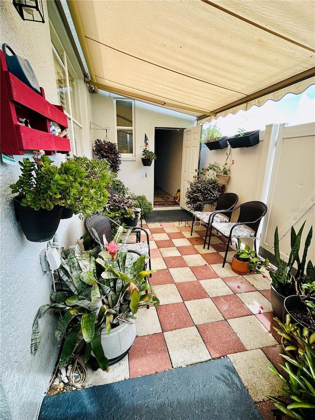2862 Grasmere View Pkwy, Kissimmee, FL 34746 - fenced backyard featuring a patio