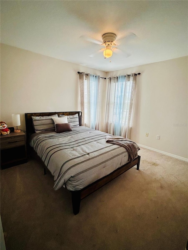 2862 Grasmere View Pkwy, Kissimmee, FL 34746 - bedroom with carpet floors and ceiling fan