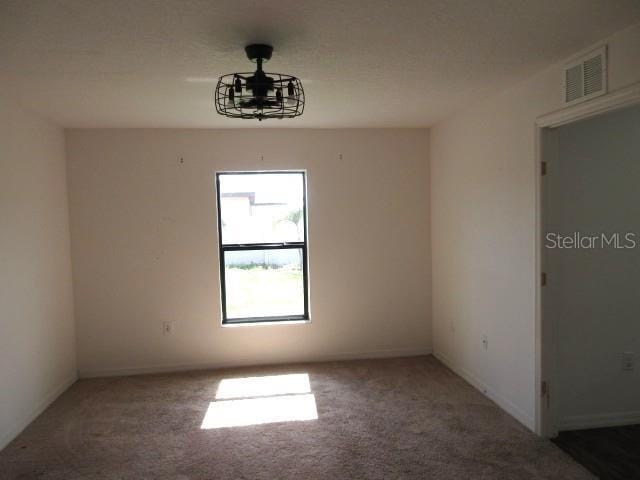 1740 Chatham Green Cir, Ruskin, FL 33570 - empty room featuring carpet floors