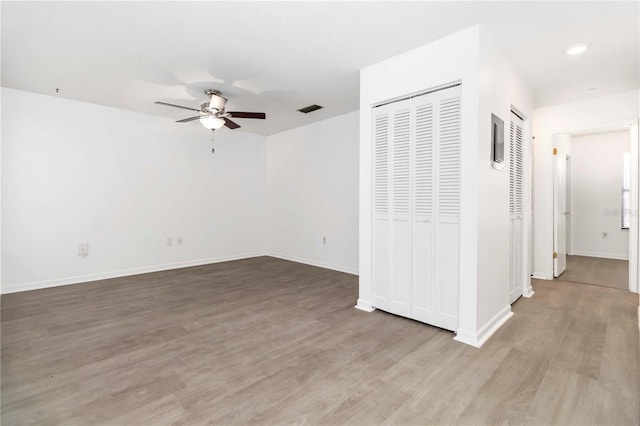 840 Center Ave Unit 80, Daytona Beach, FL 32117 - empty room featuring a ceiling fan, wood finished floors, and recessed lighting