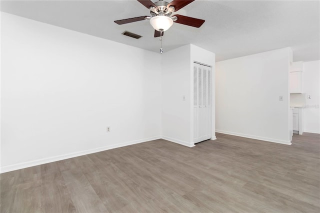 840 Center Ave Unit 80, Daytona Beach, FL 32117 - unfurnished room with light wood-style flooring and a ceiling fan