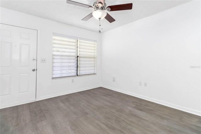 840 Center Ave Unit 80, Daytona Beach, FL 32117 - unfurnished room with ceiling fan and dark wood-style flooring