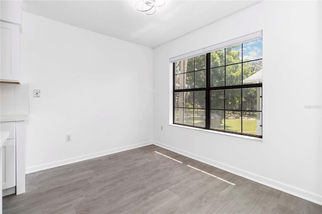 840 Center Ave Unit 80, Daytona Beach, FL 32117 - empty room featuring wood finished floors and baseboards