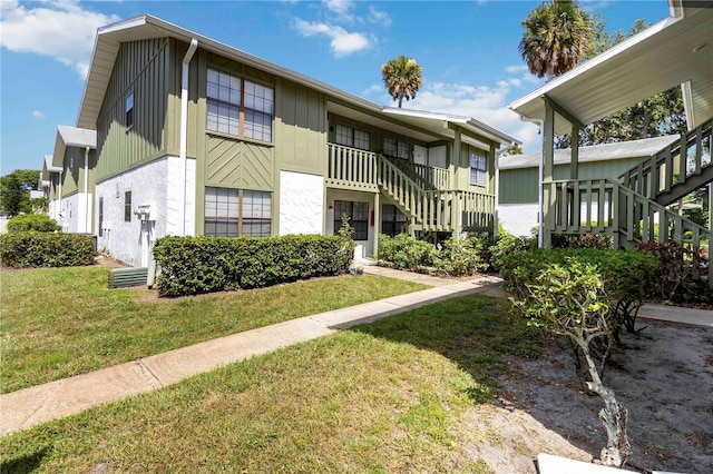 840 Center Ave Unit 80, Daytona Beach, FL 32117 - view of property featuring stairs