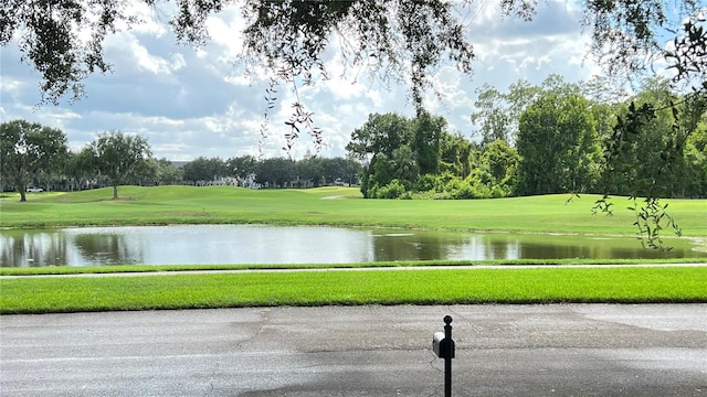 934 Westpark Dr, Celebration, FL 34747 - water view featuring a golf course and a tree filled landscape
