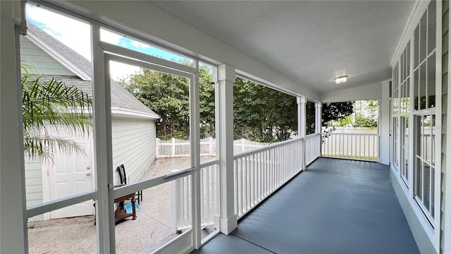 934 Westpark Dr, Celebration, FL 34747 - unfurnished sunroom with vaulted ceiling