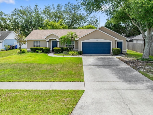 4828 Jeanette Ct, Saint Cloud, FL 34771 - ranch-style home featuring a garage, stucco siding, and concrete driveway