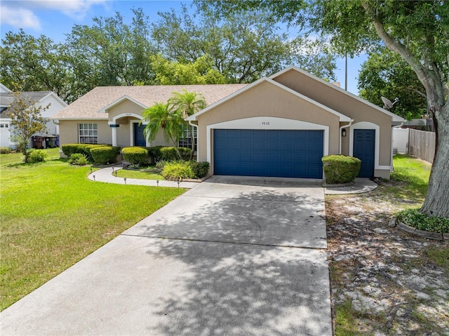4828 Jeanette Ct, Saint Cloud, FL 34771 - ranch-style home with a garage, driveway, and stucco siding