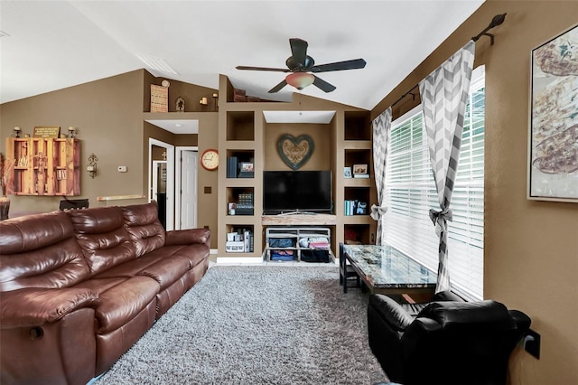 4828 Jeanette Ct, Saint Cloud, FL 34771 - living room featuring vaulted ceiling, ceiling fan, carpet floors, and built in features