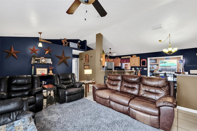 4828 Jeanette Ct, Saint Cloud, FL 34771 - living area with ceiling fan, a chandelier, light tile patterned flooring, and vaulted ceiling