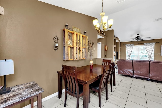 4828 Jeanette Ct, Saint Cloud, FL 34771 - dining room featuring a chandelier, ceiling fan, and light tile patterned floors