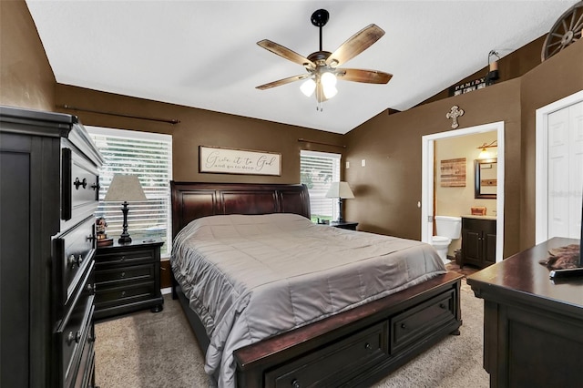 4828 Jeanette Ct, Saint Cloud, FL 34771 - carpeted bedroom with lofted ceiling, ensuite bathroom, and ceiling fan