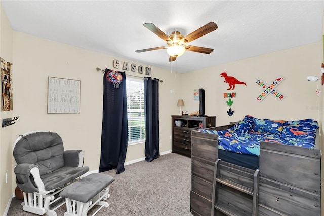 4828 Jeanette Ct, Saint Cloud, FL 34771 - carpeted bedroom with baseboards and a ceiling fan