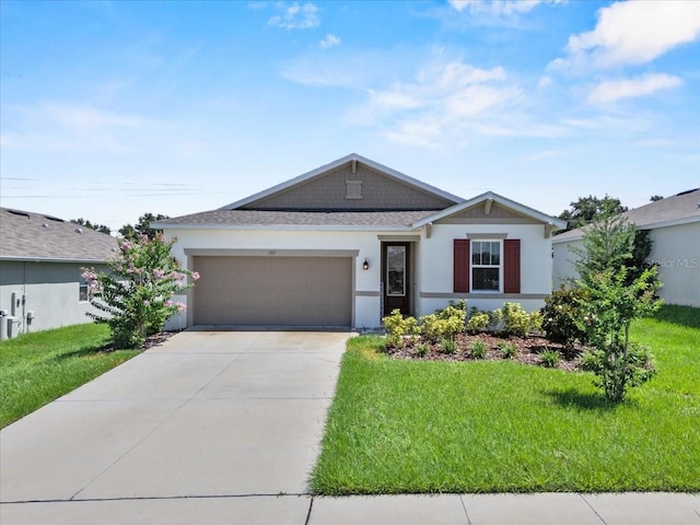1717 Hilltop Dr, Dundee, FL 33838 - ranch-style house featuring an attached garage, concrete driveway, a front lawn, and stucco siding