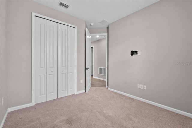 1717 Hilltop Dr, Dundee, FL 33838 - unfurnished bedroom with a closet and carpet
