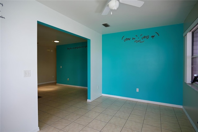 926 Chula Ct, Lady Lake, FL 32159 - empty room with a ceiling fan and light tile patterned flooring