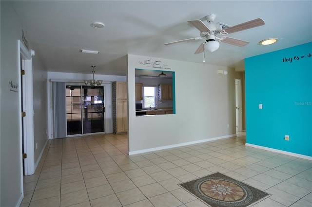 926 Chula Ct, Lady Lake, FL 32159 - unfurnished room with light tile patterned floors, a ceiling fan, and a chandelier