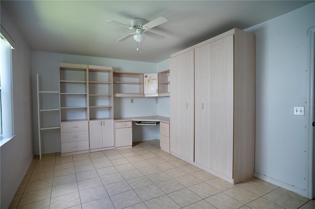 926 Chula Ct, Lady Lake, FL 32159 - unfurnished office with ceiling fan, light tile patterned floors, and built in study area