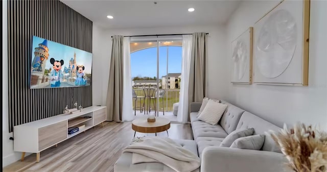 8103 Coconut Palm Way Unit 203, Kissimmee, FL 34747 - living area featuring wood finished floors and recessed lighting