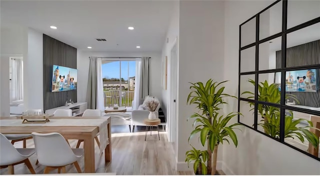 8103 Coconut Palm Way Unit 203, Kissimmee, FL 34747 - dining area with wood finished floors and recessed lighting