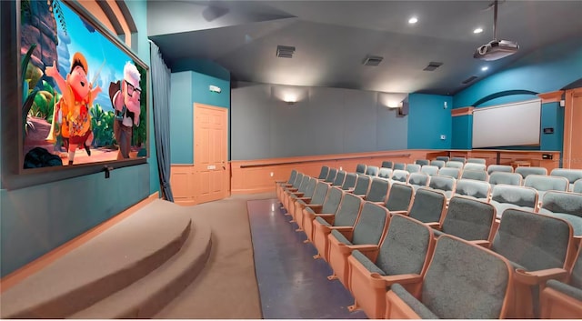 8103 Coconut Palm Way Unit 203, Kissimmee, FL 34747 - cinema room featuring carpet flooring, vaulted ceiling, a decorative wall, and recessed lighting