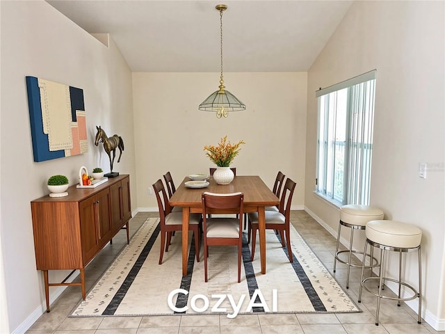 162 Seneca Point Trl, Kissimmee, FL 34746 - dining room featuring light tile patterned floors and lofted ceiling