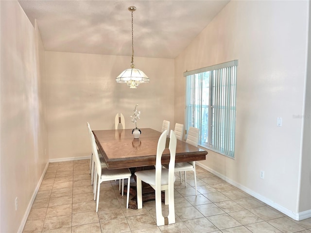 162 Seneca Point Trl, Kissimmee, FL 34746 - dining room featuring light tile patterned floors and lofted ceiling