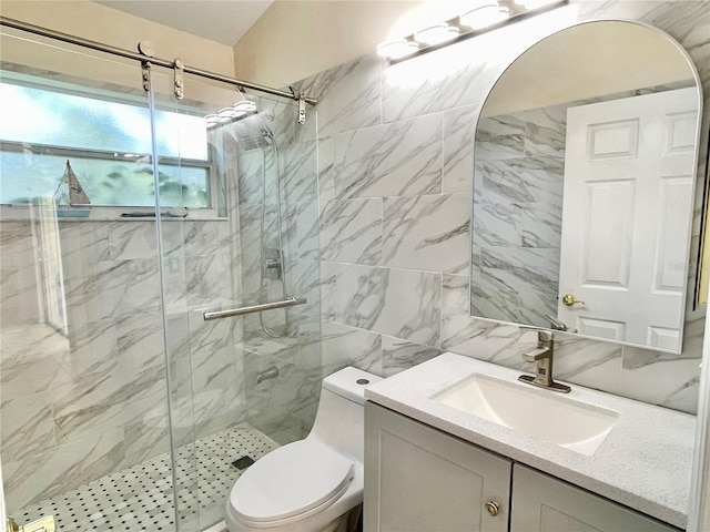 162 Seneca Point Trl, Kissimmee, FL 34746 - full bathroom with a marble finish shower, vanity, and tile walls