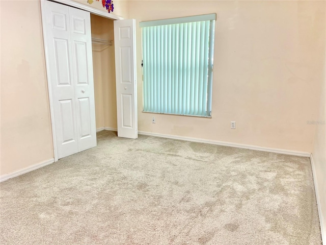 162 Seneca Point Trl, Kissimmee, FL 34746 - unfurnished bedroom with carpet and a closet