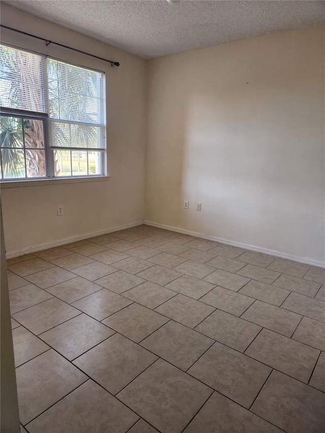 3502 Windy Walk Way Unit 2-208, Orlando, FL 32837 - empty room featuring a textured ceiling