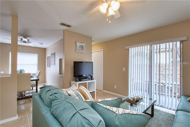 4160 Pershing Pointe Pl Unit 1, Orlando, FL 32822 - living area featuring ceiling fan and light tile patterned flooring