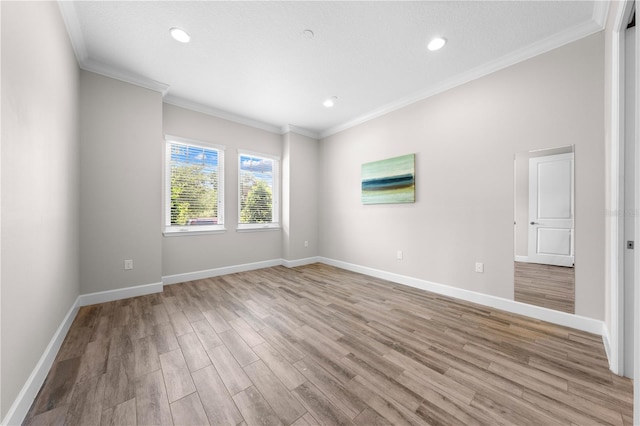 9121 Laureate Blvd, Orlando, FL 32827 - empty room with light wood-type flooring, crown molding, and recessed lighting