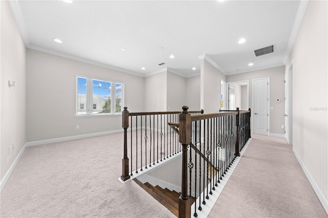 9121 Laureate Blvd, Orlando, FL 32827 - hall with an upstairs landing, light carpet, ornamental molding, and recessed lighting