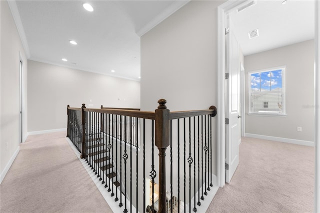 9121 Laureate Blvd, Orlando, FL 32827 - hall featuring light colored carpet, an upstairs landing, ornamental molding, and recessed lighting