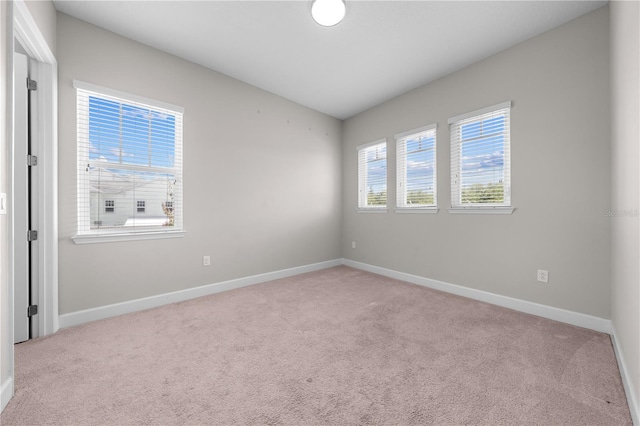 9121 Laureate Blvd, Orlando, FL 32827 - spare room featuring carpet and lofted ceiling