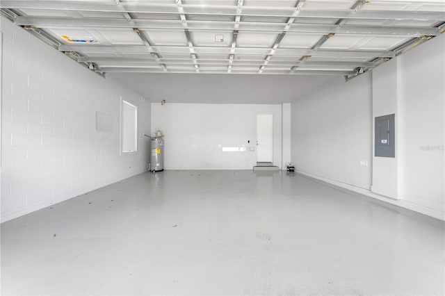 9121 Laureate Blvd, Orlando, FL 32827 - garage featuring electric water heater, electric panel, and concrete block wall