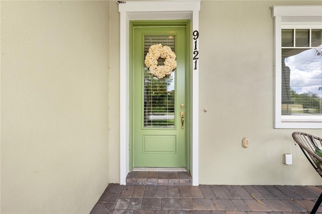 9121 Laureate Blvd, Orlando, FL 32827 - entrance to property featuring stucco siding