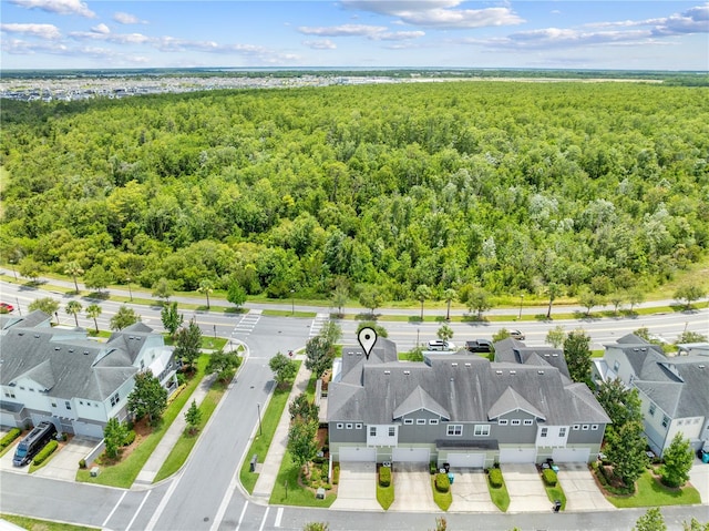 9121 Laureate Blvd, Orlando, FL 32827 - aerial perspective of suburban area featuring a forest